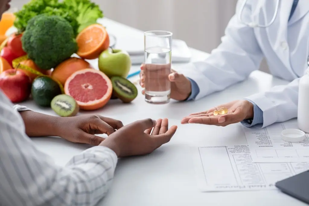 Dietologist providing supplement guidance for wellness support