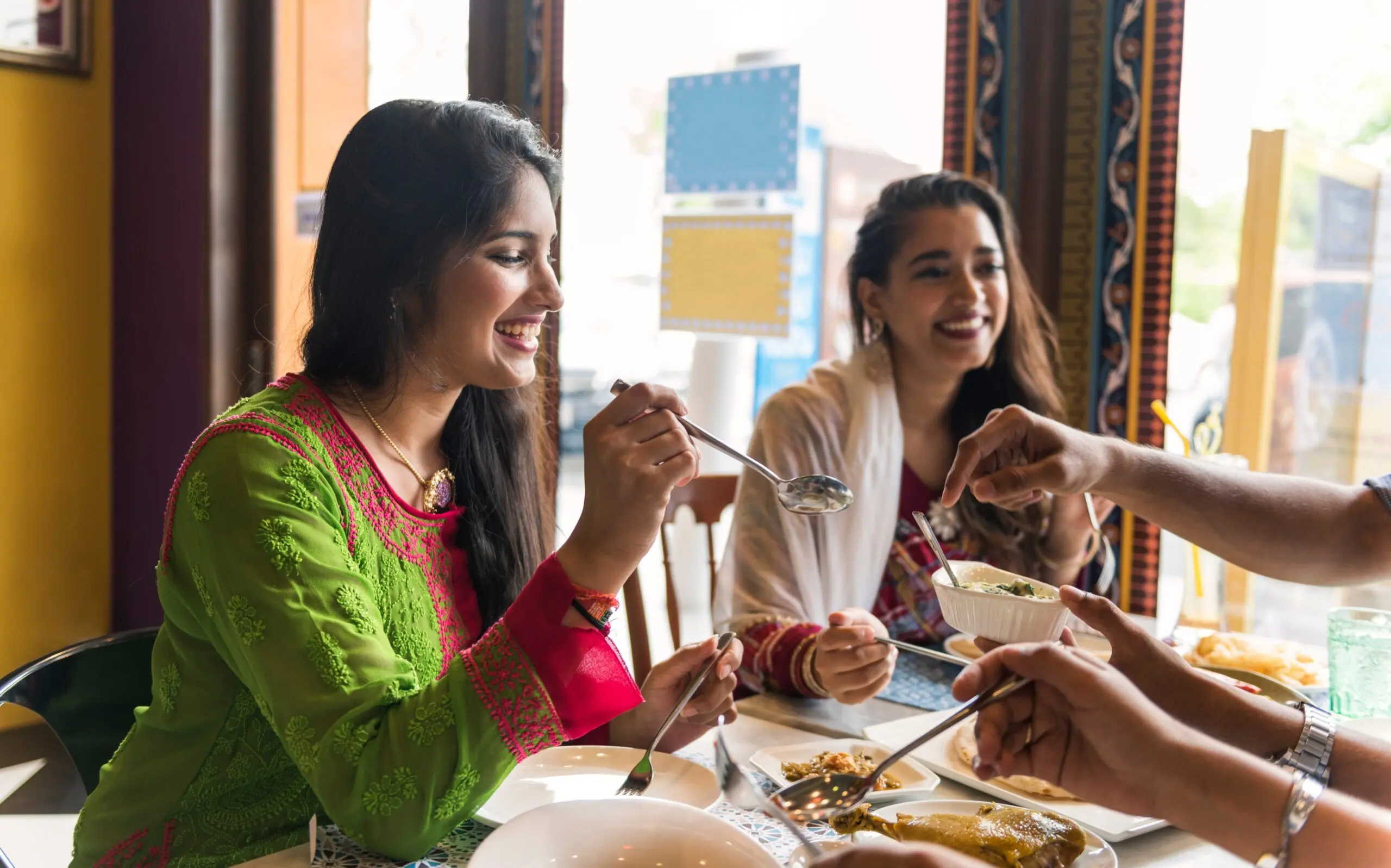 Indian community dining together promoting shared nutrition