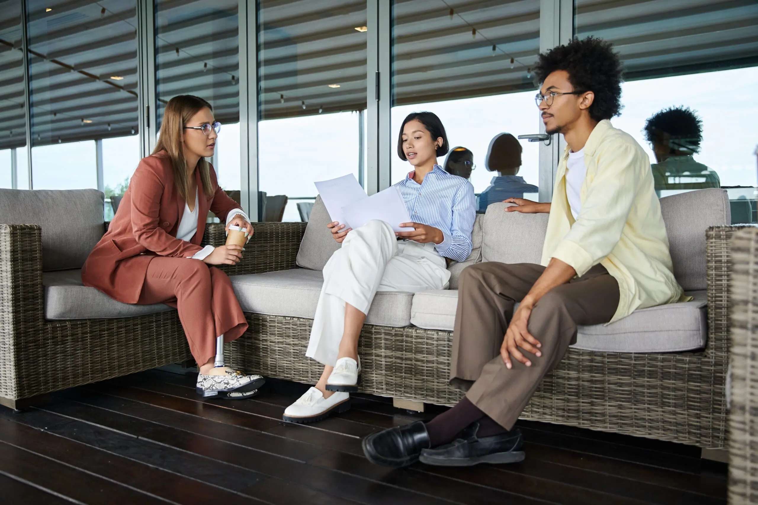 Colleagues collaborating on rooftop for wellness initiatives